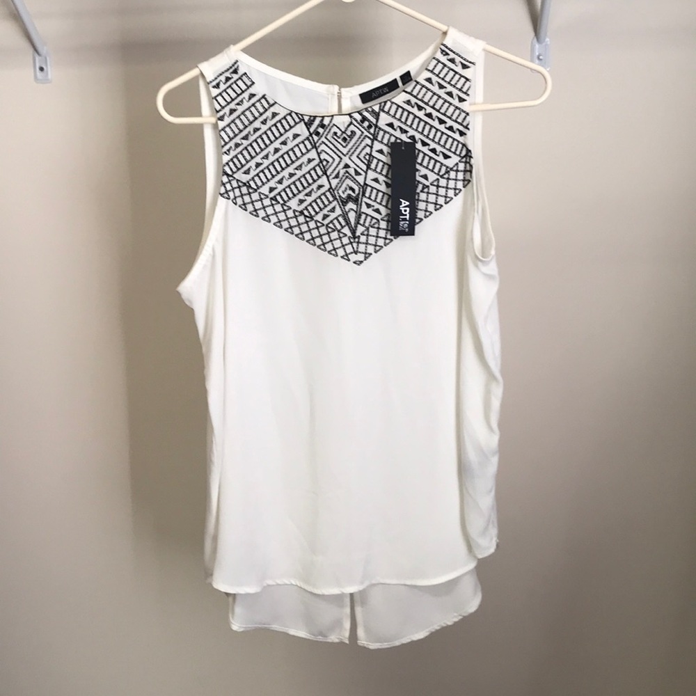 Cream and black sleeveless shirt
